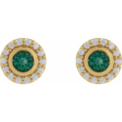 14k-white-gold-natural-london-blue-topaz-&-1/5-ctw-natural-diamond-halo-style-stud-earrings
