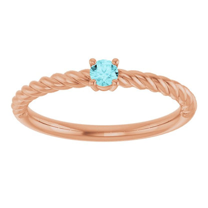 14k-rose-gold--natural-blue-zircon-solitaire-rope-ring