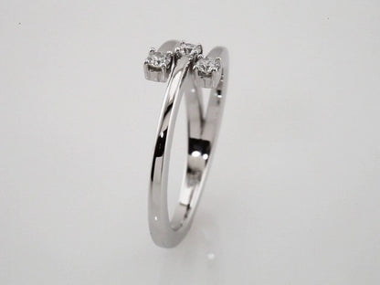 14k-white-gold-1/5-ctw-natural-diamond-
bypass-ring